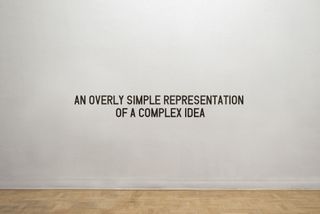 An Overly Simple Representation of a Complex Problem (2013) Medium: Vinyl lettering on wall.