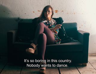 It&amp;apos;s So Boring in This Country. Nobody Wants to Dance. (2017) is a photograph of Zofia Krawiec taken by Maciej Ratajski during a techno party in the famous Pogłos club in Warsaw. It was used to promote the Trips For The Lonely Hearted series of parties. The photo is styled after a still from a 1971 movie by Shūji Terayama, Throw Away Your Books, Rally in the Streets.
